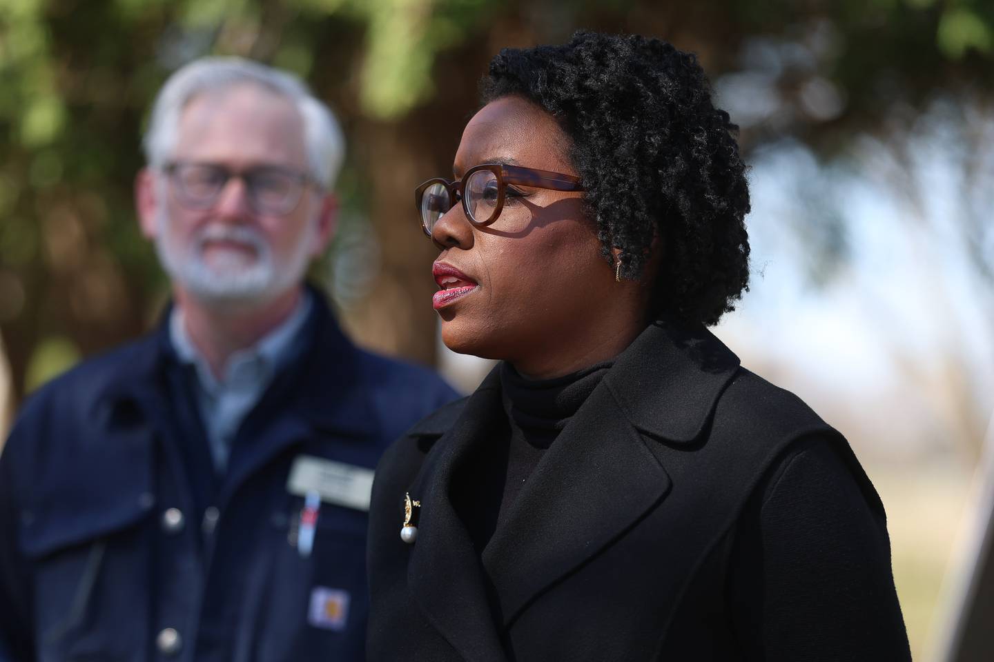 U.S. Rep. Lauren Underwood, D-Naperville, speaks to a Plainfield Park District employee before presenting a check for $250,000 for the Bentley Road pathway connection on Tuesday, April 7, 2026 in Plainfield. The Plainfield Park District is in the very early stages creating a four mile pathway, a vital link between Riverside Parkway, Sunset Park, and Hammel Woods trails along the DuPage River corridor.