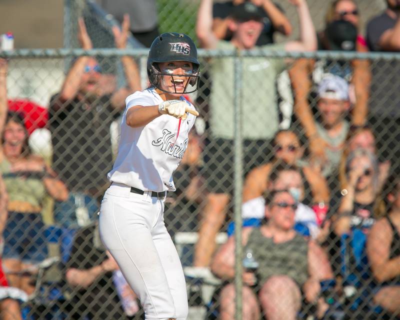 Huntley's Reese Hunkins celebrates after scoring in the fifth inning against Harlem during the Class 4A Huntley Sectional championship game on June 10, 2021.