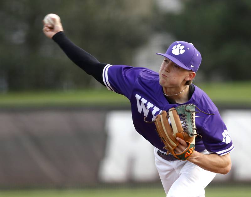 Hampshire's Calen Scheider throws a pitch during a Fox Valley Conference baseball game against Huntley on Monday, April 28, 2025, at Huntley High School.