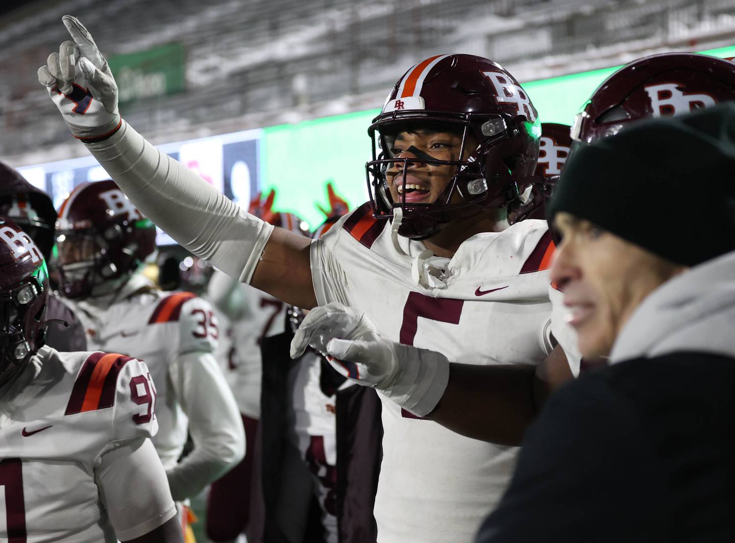Brother Rice's Kameron McGee celebrates as time ticks away Wednesday, Dec. 3, 2025, during their IHSA Class 7A state chamionship win over St. Rita in Huskie Stadium at Northern Illinois University in DeKalb.