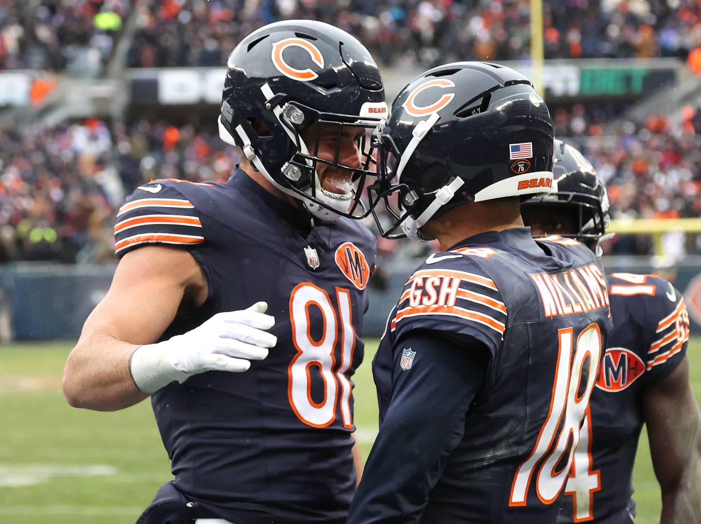 Chicago Bears quarterback Caleb Williams celebrates with Chicago Bears tight end Durham Smythe after scoring a go-ahead touchdown late in the fourth quarter Sunday, Nov. 9, 2025, during their game at Soldier Field in Chicago.