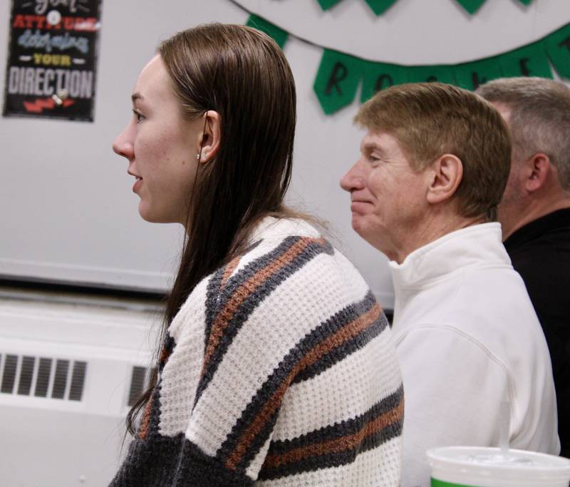 Mallory Pisnke and Tom DePasquale are recognized by the Rock Falls High School board of education for being Shoulder to the Wheel recipients from the Rock Falls Chamber of Commerce.