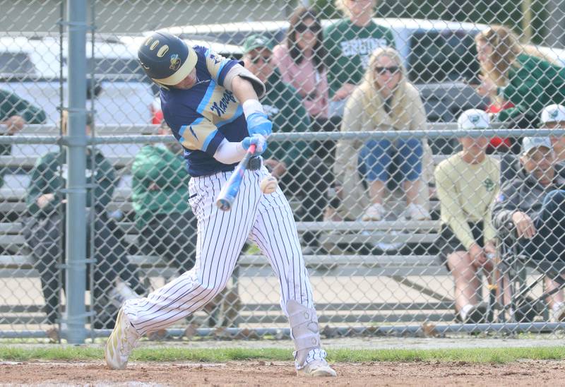 Marquette's Anthony Couch gets a hit against St. Bede on Tuesday, April 28, 2026 at Masinelli Field in Ottawa.