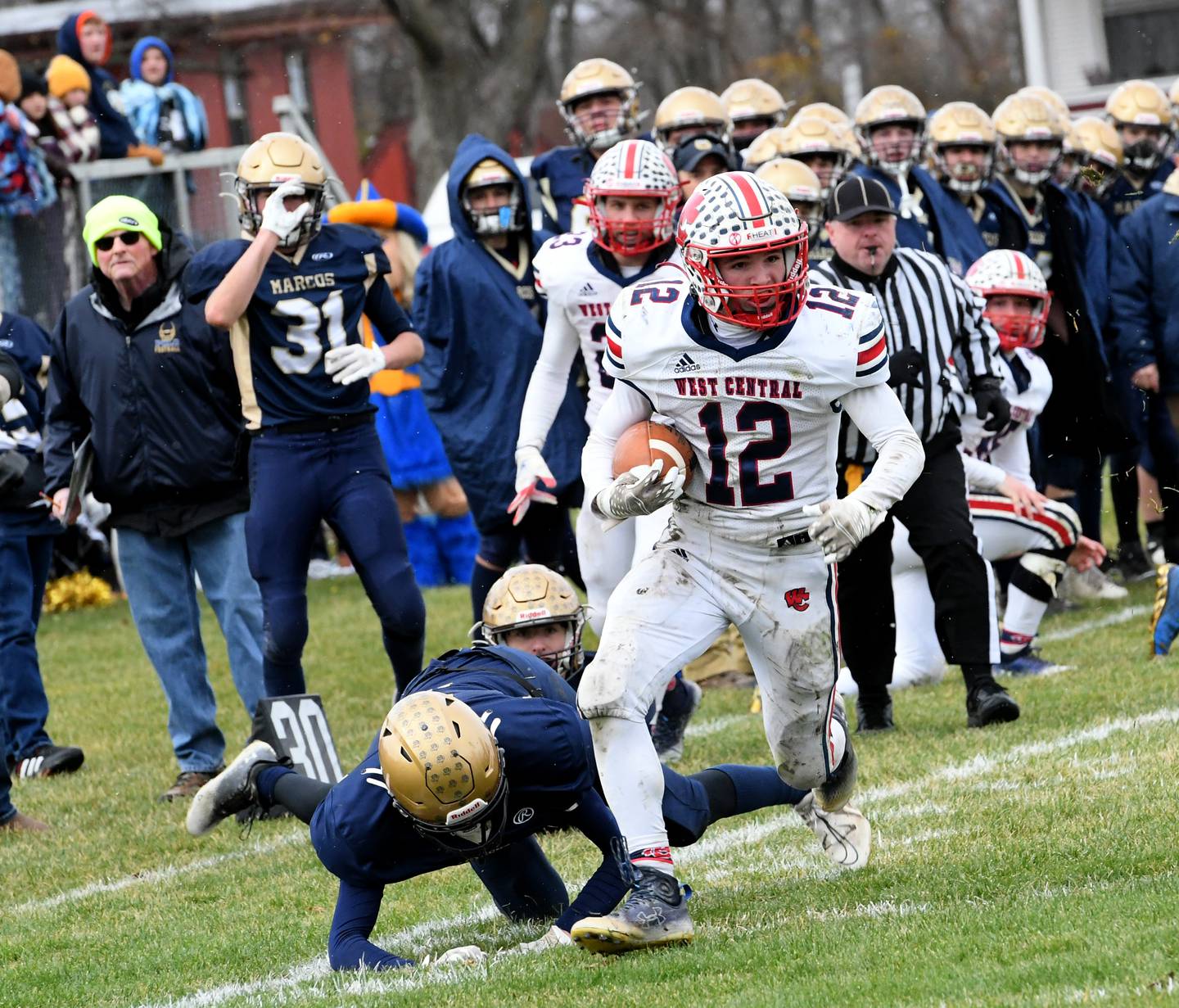 West Central's Kaiden Droste turns the corner for a gain during 8-man playoff action against Polo on Saturday, Nov. 12 in Polo.