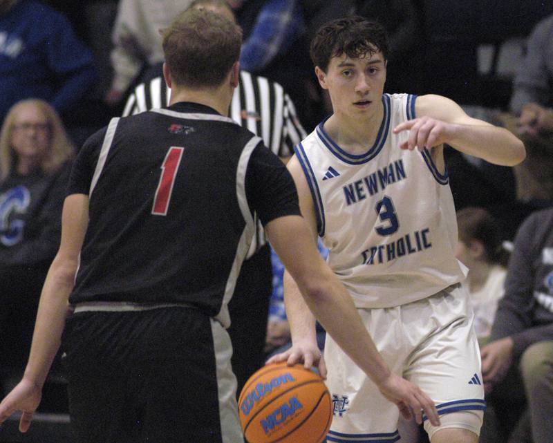 Newman's Garret Matznick directs traffic under the basket.  The Newman Comets hosted the Erie-Prophetstown Panthers in a Conference game. played at Newman High School on February 6, 2026.