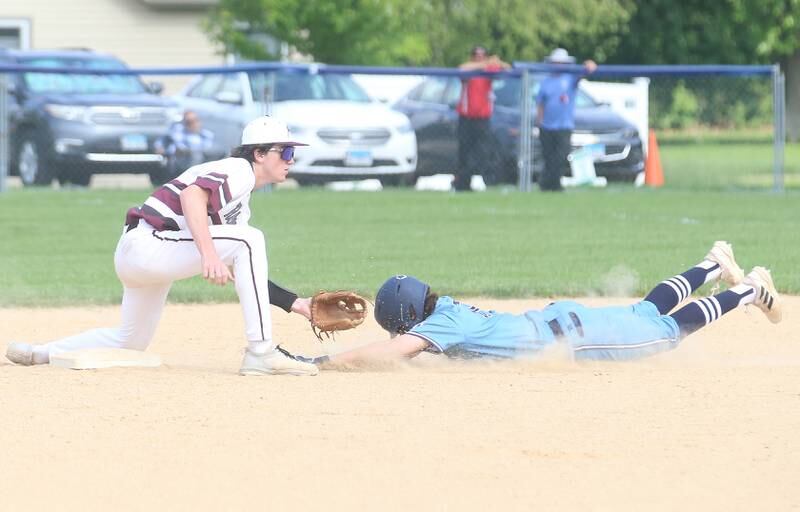 Bureau Valley's Logan Philhower slides under the tag of Rockridge's Cullen Schwigen during the Class 2A Regional semifinal game on Thursday, May 16, 2024 at Princeton High School.