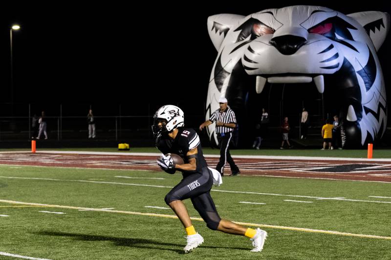 Plainfield North's Treycen Bownes runs the ball during the Oct. 11 game against Minooka held at Plainfield North
