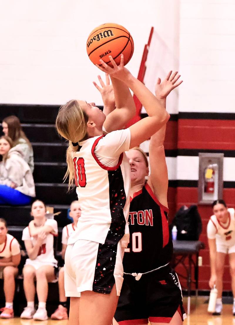 Fulton Steamer Ariah Mitchell tries to block EP's Lauren Punke as she goes up for another 2 points for the Panthers Tuesday night in Erie.