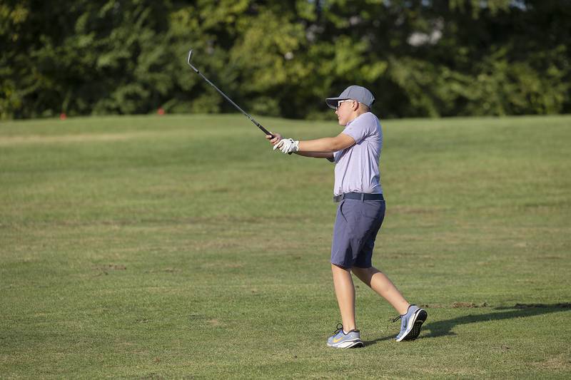 Henry Hayes, 10, chips onto the green Wednesday, Sept. 10, 2025, at Timber Creek’s first hole.