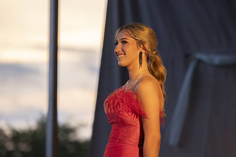 Hope Wallin takes the stage for the evening gown competition Wednesday August 2, 2023 during the Miss Ogle County pageant.