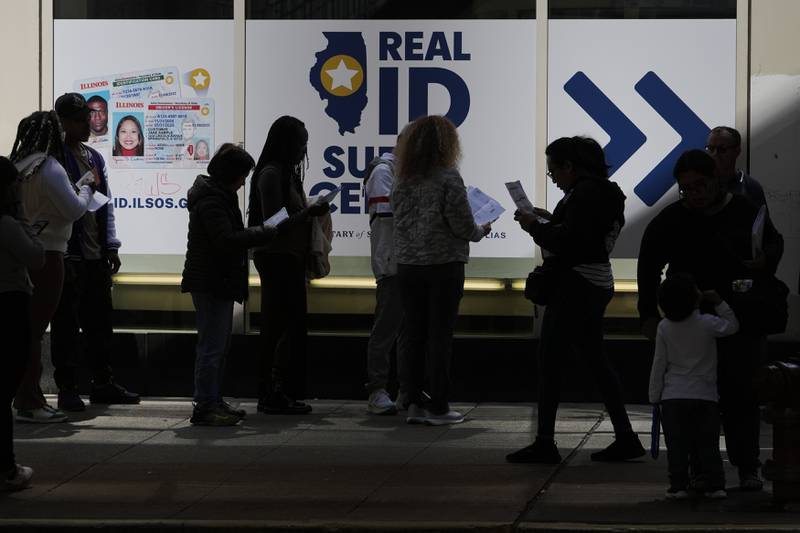 People line up to apply for Real ID at a Real ID Supercenter in downtown Chicago, Tuesday, May 6, 2025.