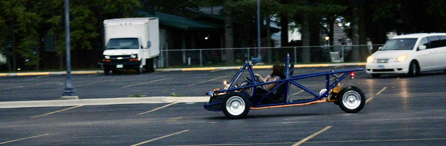 Members of the board of education and administration pilot a Switch electric vehicle during a demonstration Wednesday. The vehicle was assembled by Sterling High School physics students. The vehicle can be disassembled and reassembled by subsequent classes.