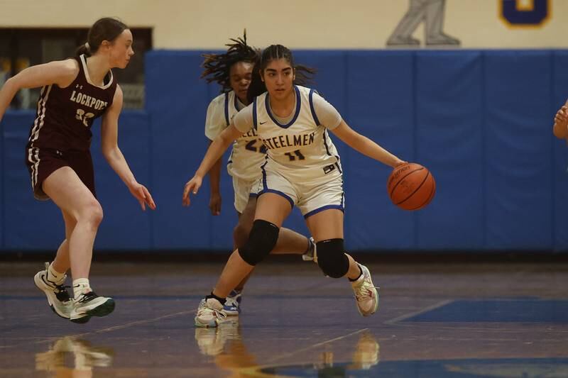 Joliet Central’s Isabel Sanchez takes the ball upcourt against Lockport.
