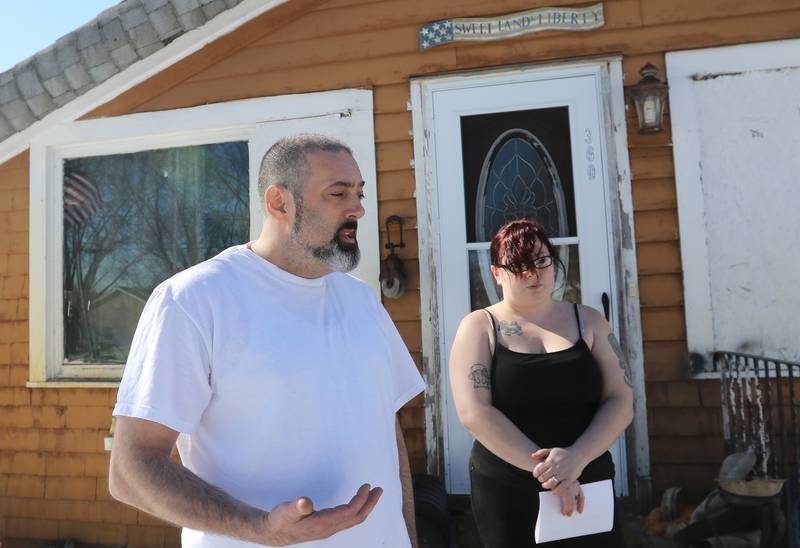 Cayce Williams, left, speaks on his behalf with niece Amber Robarge, right, regarding his parole on Friday, Feb. 26, 2021 in Crystal Lake.  Williams, 47, was convicted in the 1997 murder and sexual assault of an Elgin toddler and was granted parole after 24 years in prison.  Williams will be residing at his brother's girlfriend's house on Briarwood Rd., approximately three blocks from West Elementary School and about five blocks from West Beach.