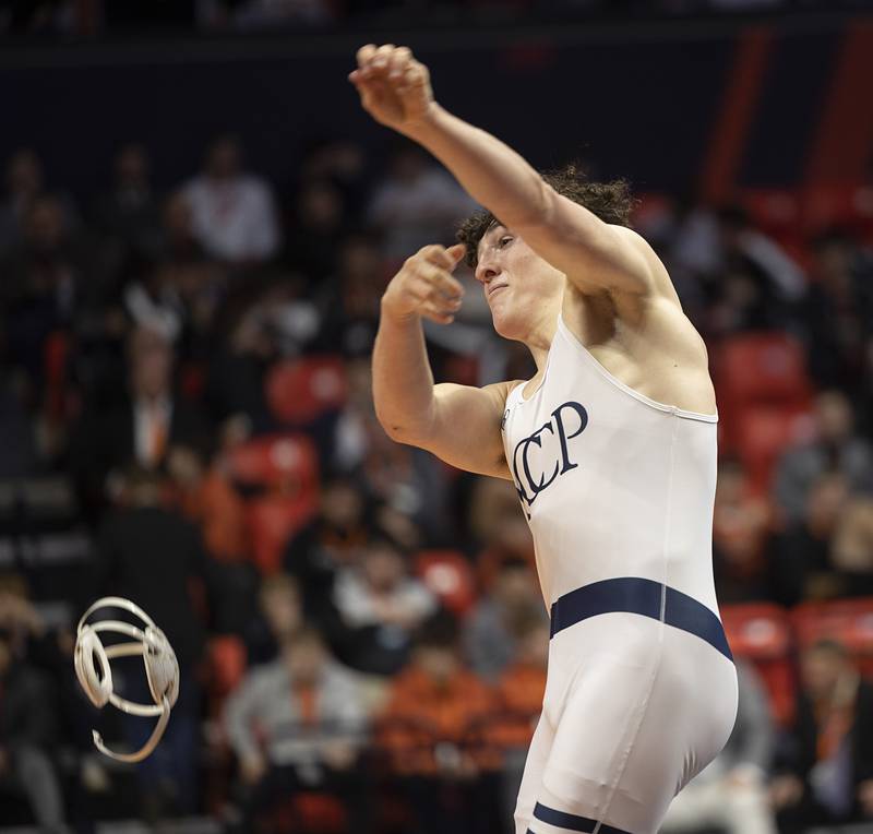 IC Catholic’s Brody Kelly celebrates winning the 2A 175 class Saturday, Feb. 21, 2026, at the IHSA wrestling finals in Champaign.