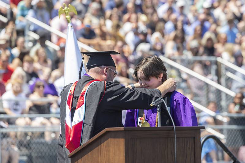 Class of 2026 valedictorian Esther Mertes receives her medal for the honor Sunday, May 24, 2026, during commencement.