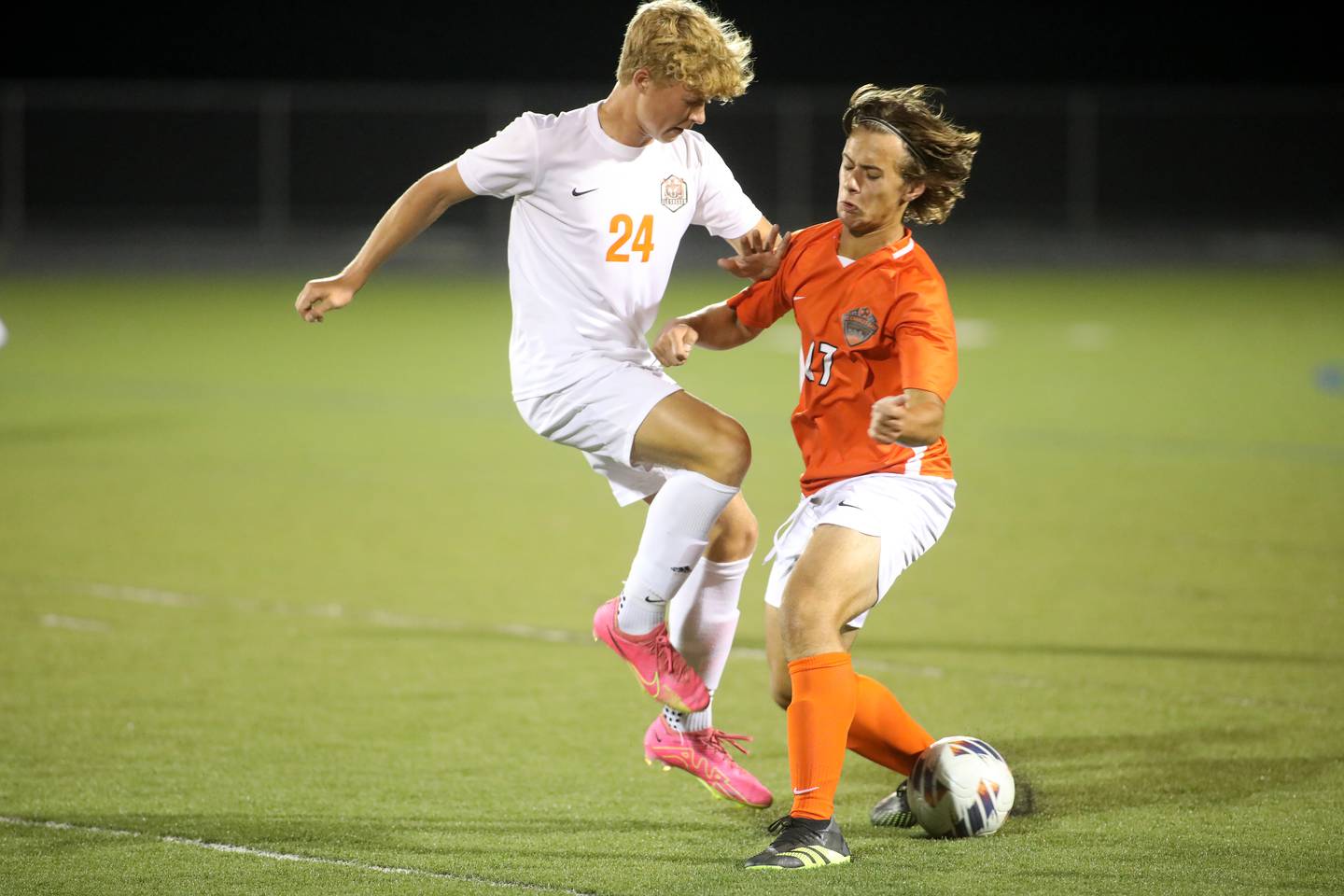 Crystal Lake Central’s Gavin Kane (left) and St. Charles East’s Robert Kutrovatz (right) attack the ball during a game  at Streamwood on Tuesday, Sept. 12, 2023.