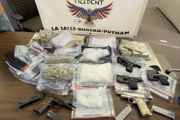 Two charged in Bureau County after cops seize guns, cocaine, cash