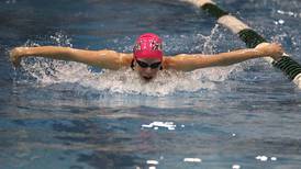 Plainfield co-op Kramer makes history, wins 100 butterfly