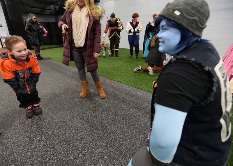 Benjamin Adler of Glen Ellyn enjoys seeing an Avatar during the Toys for Tots drive held at Ackerman Sports and Fitness Center Sunday Dec 4, 2022.