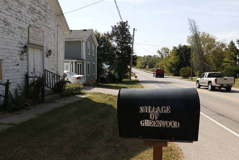 Vehicles travel past the Village Hall and Museum on Thursday, Sept. 19, 2024, in the Village of Greenwood.