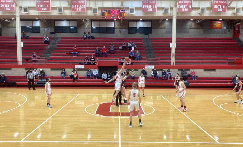 Ottawa (in white) and Morris (in maroon) tip off their Wednesday night Interstate Eight Conference game in Kingman Gym on Jan. 19, 2022.