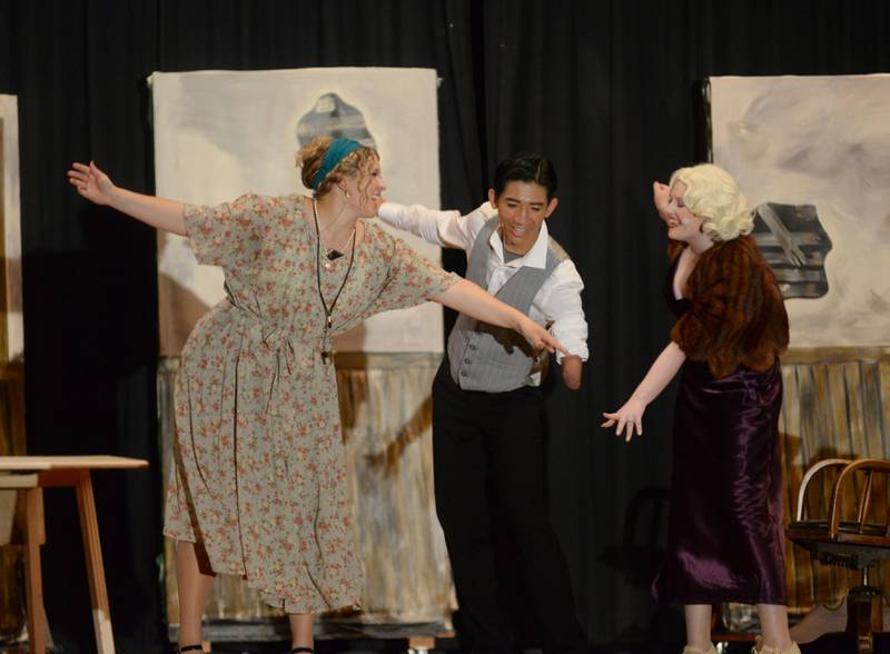 Miss Hannigan (Sydni Badertscher), Rooster (Lucas Nelson) and Lily St. Regis (Cammie Kent) plan how to get the reward for Orphan Annie during Forreston High School's performance of Annie on Sunday, April 28, 2024.