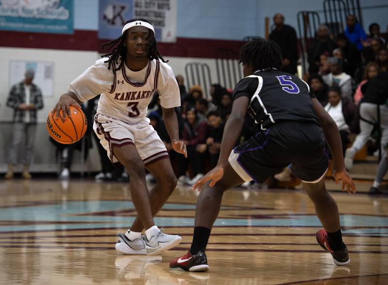 Kankakee's Cedric Terrell III, left, controls the ball as Thornton's DaKari Nesbitt guards in a game on Friday, December 12, 2025.
