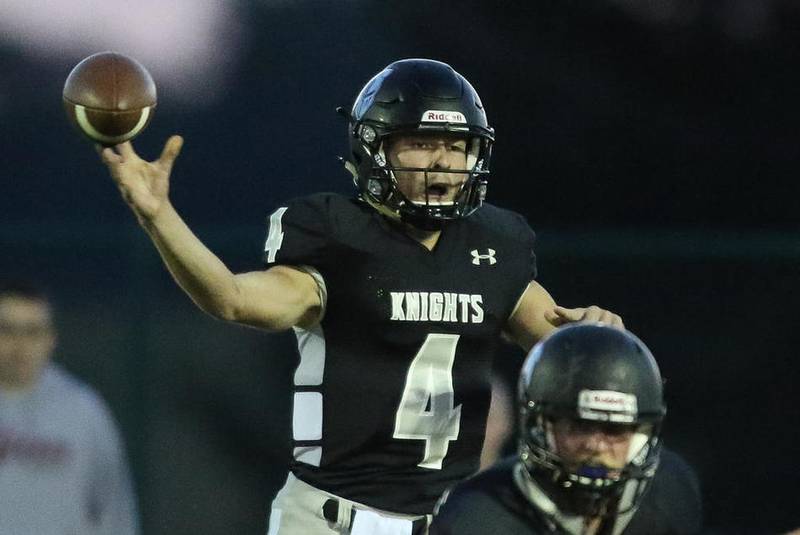 Kaneland quarterback Jack Douglas (4) throws a pass against Geneva at Kaneland High School in Maple Park September 02.