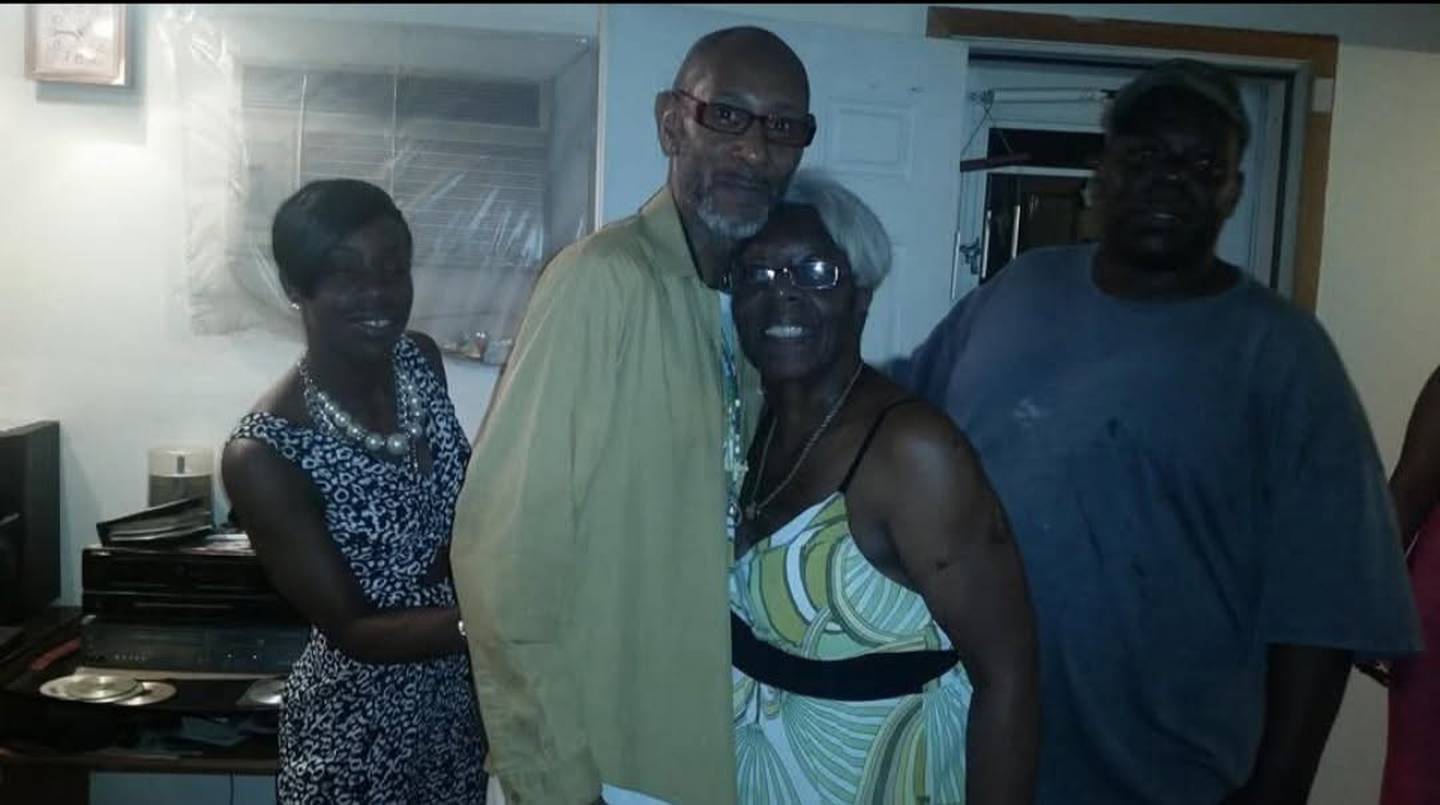 Maurice R. Norington, center, who died from injuries sustained during the March 10, 2026 tornado, is pictured with family.