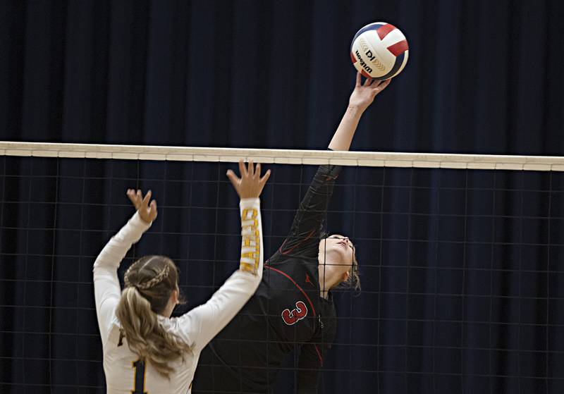 Fulton’s Annaka Hackett plays the ball over the net against Polo’s Laynie Mandrell Thursday, Sept. 14, 2023 in Polo.