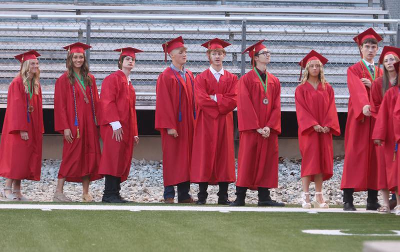 La Salle-Peru Township High School graduates walk to receive their diplomas during the L-P Class of 2026 commencement ceremony on Thursday, May 14, 2026 at Howard Fellows Stadium.