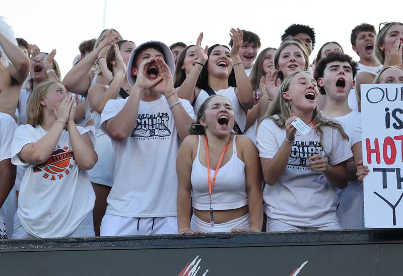 DeKalb fans cheer on their team during the First National Challenge game Friday, Aug. 25, 2023, in Huskie Stadium at Northern Illinois University in DeKalb.