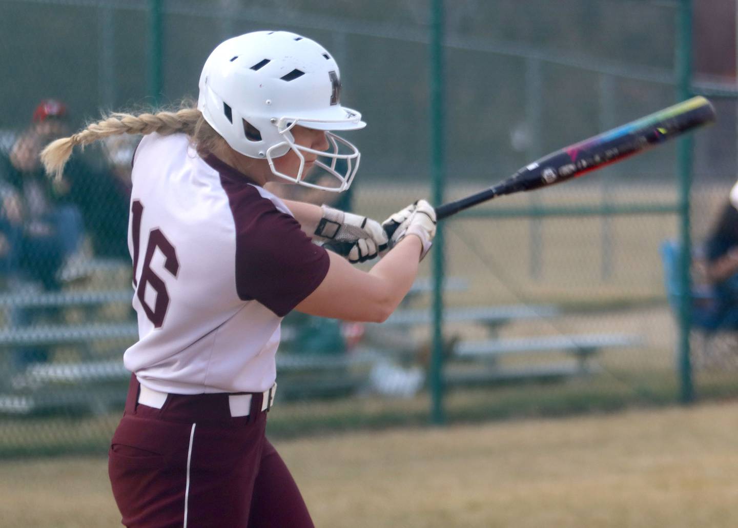 Marengo’s Mia Lulinski makes contact during a win over Belvidere in varsity softball at Marengo on Monday.