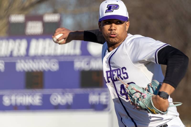 Plano's Jason Phillips delivers a pitch during Monday's game with Aurora Central Catholic.