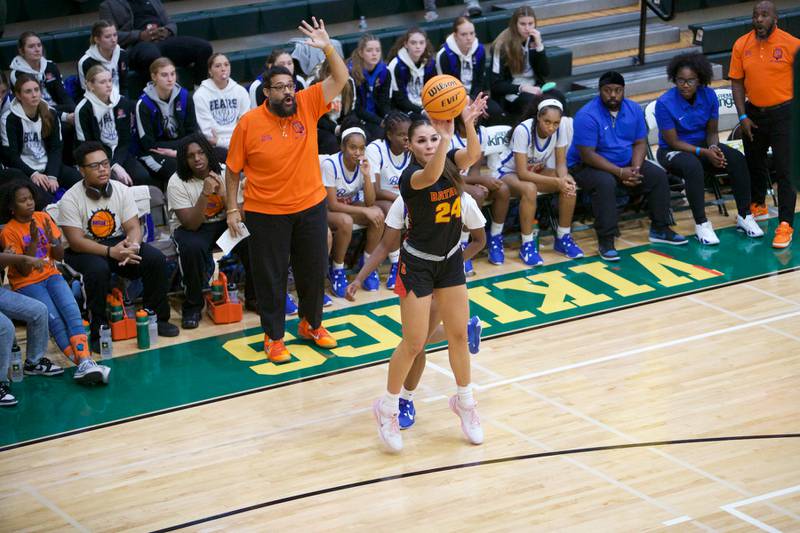 Batavia's Hallie Crane shoots a three pointer against Butler during the Dave Yates Chicagoland Showcase on Saturday, Dec7,2024 at Fremd in Palatine.