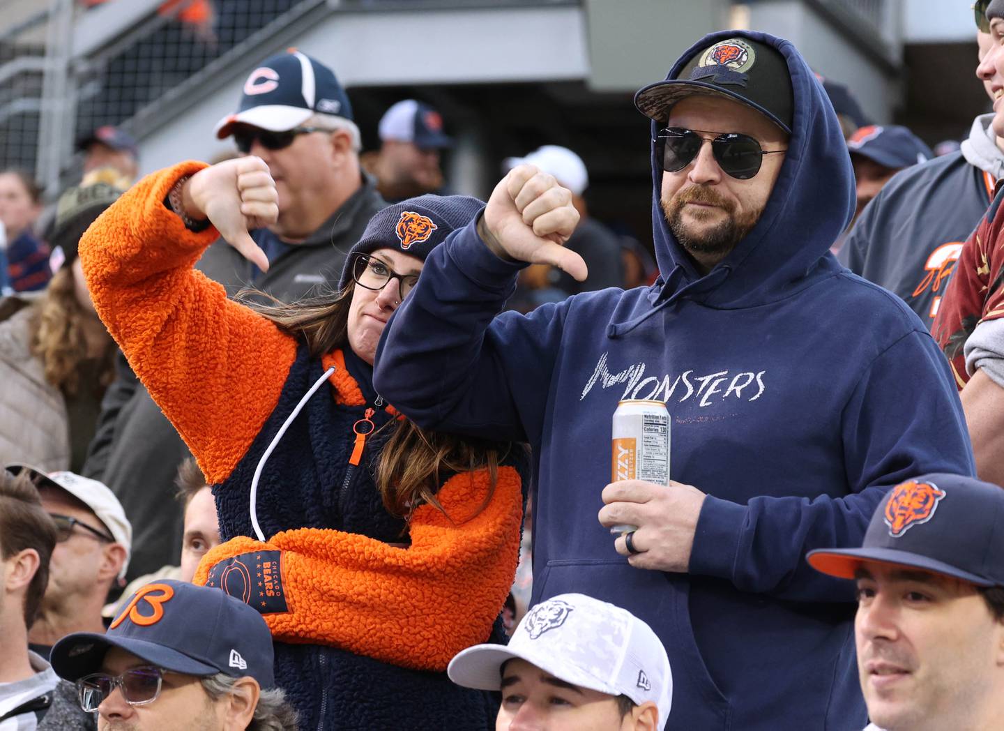 Chicago Bears fans show their frustration during their game against the New England Patriots Sunday, Nov. 10, 2024, at Soldier Field in Chicago.