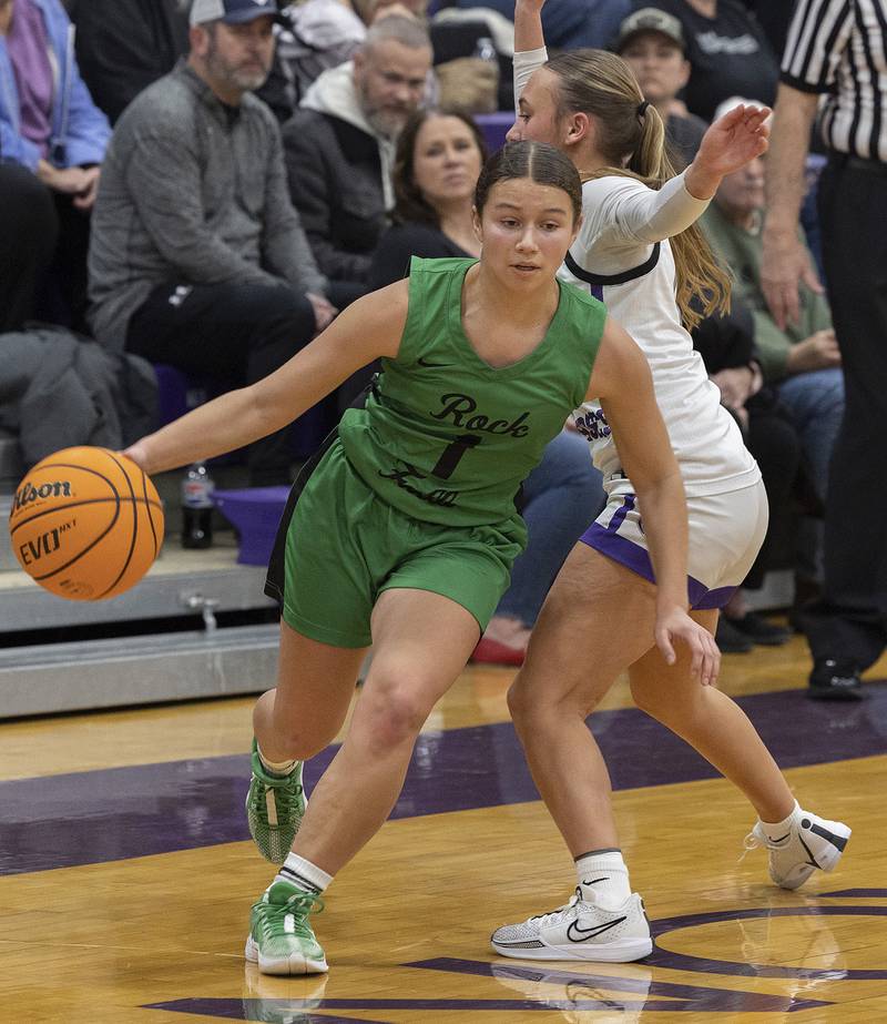 Rock Falls’ Elizabeth Lombardo handle the ball against Dixon Friday, Jan. 31, 2025, at Dixon High School.