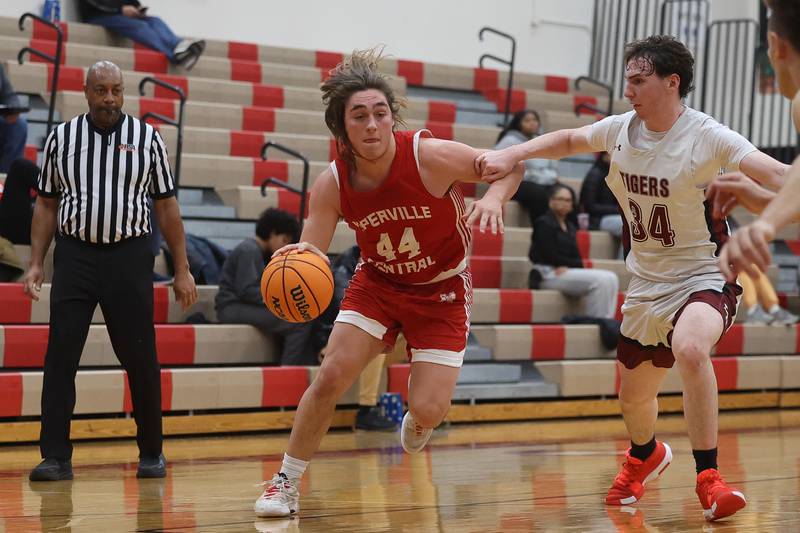 Naperville Central’sDaniel Nussbaum drives to the baseline against Plainfield North on Wednesday, Jan 22, 2025 in Plainfield.