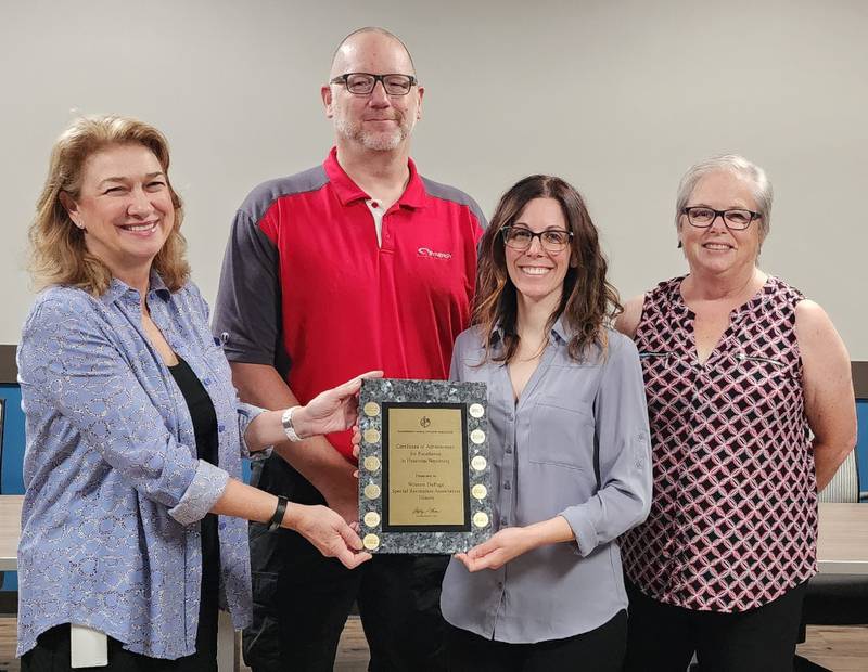 The Certificate of Achievement for Excellence in Financial Reporting has been awarded to Western DuPage Special Recreation Association. Pictured from left are Kathy Noviskis, administrative assistant, Curtis Lease, Business Services manager, Natalie Principe, superintendent of Finance  & Business Servies, and Ann Kenedy, executive assistant.