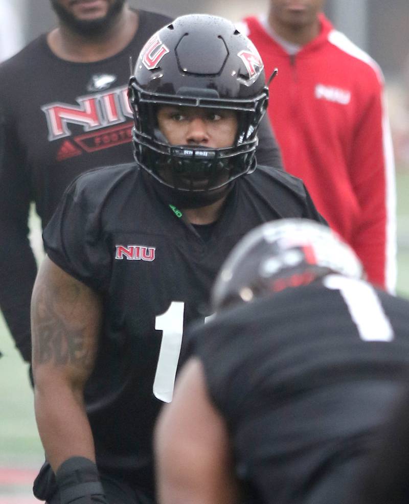 Northern Illinois University linebacker Kyle Pugh gets set for a play during spring practice Wednesday, March 23, 2022, at NIU in DeKalb.
