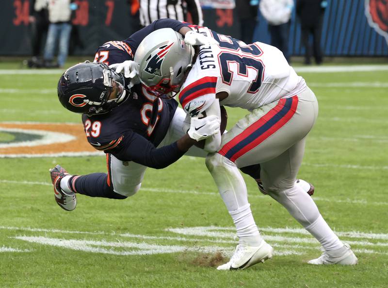 Chicago Bears cornerback Tyrique Stevenson brings down New England Patriots running back Rhamondre Stevenson during their game Sunday, Nov. 10, 2024, at Soldier Field in Chicago.