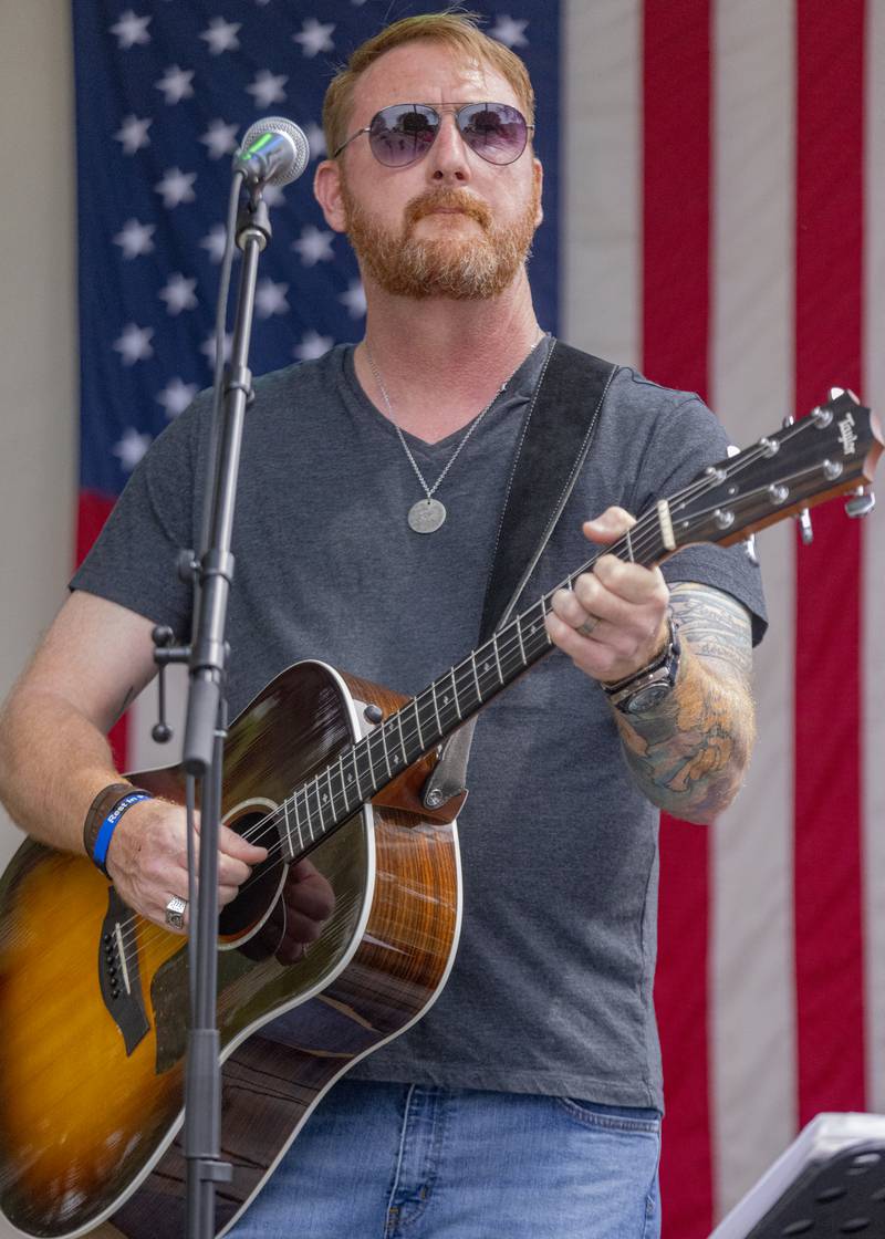 K.C. Adams performs on stage with his band Small Town Smoke on Saturday, June 15, 2024, during Beef and Ag Days at Soldiers and Sailors Park in Princeton.