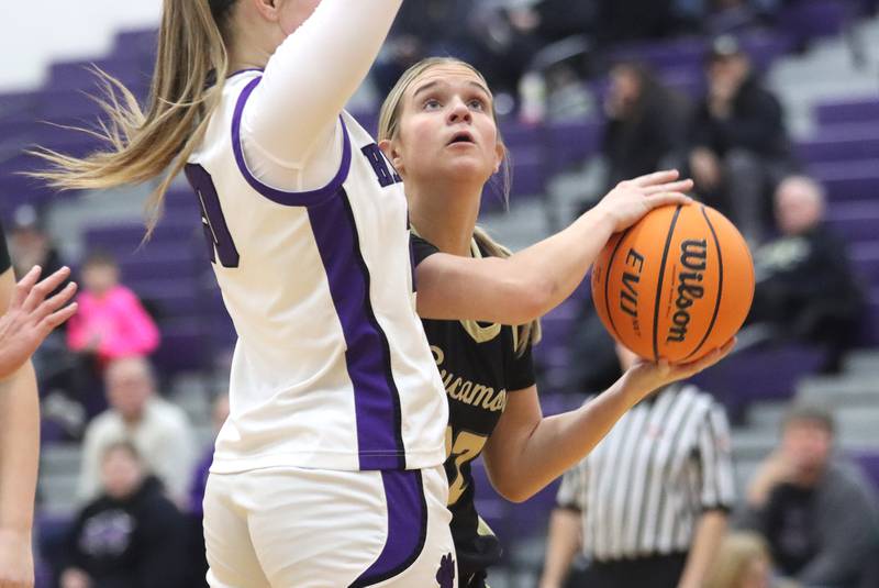 Hampshire’s Quinn Carrier looks for a shot in varsity girls basketball on Friday, Jan. 3, 2025, at Hampshire High School in Hampshire.