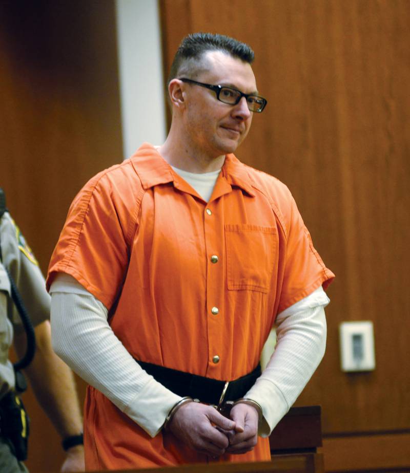 Duane Meyer looks at his family as he enters an Ogle County courtroom for a status hearing on Thursday, Nov. 7, 2024.
