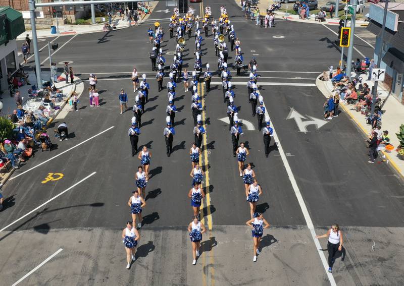 The Princeton High School poms and marching band walk down South Main Street during the 54th annual Homestead Festival parade on Saturday, Sept. 6, 2025 in Princeton.