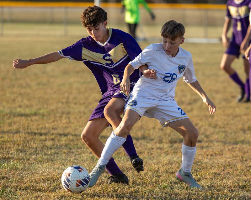 Damien Gonzalez (6) of Serena and Chase Dickmann (26) of Somonauk/Leland/Newark fight over possession of ball on Monday, Sept. 29, 2025, at Serena High School in Serena.