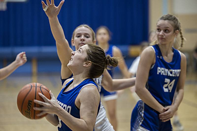 Princeton’s Miyah Fox drives the baseline against Newman Thursday, Dec. 14, 2023 at Newman High School.