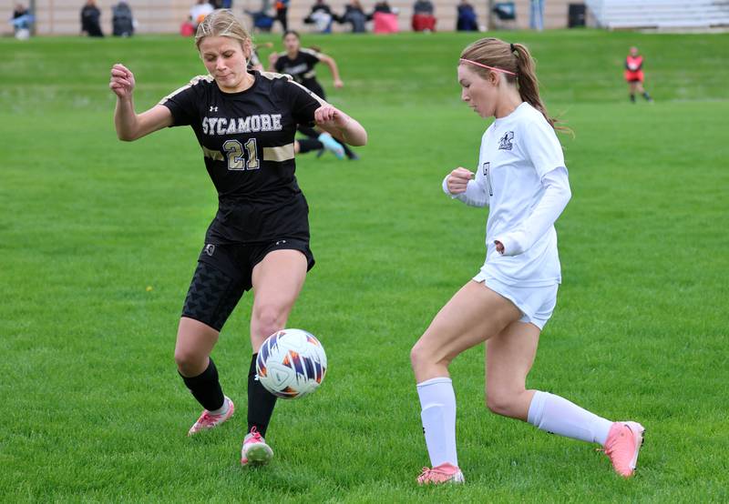 Sycamore's Kelsie Ryder tries to steal the ball from Kaneland's Olivia Davis during their game Wednesday, April 29, 2026, at Sycamore High School.