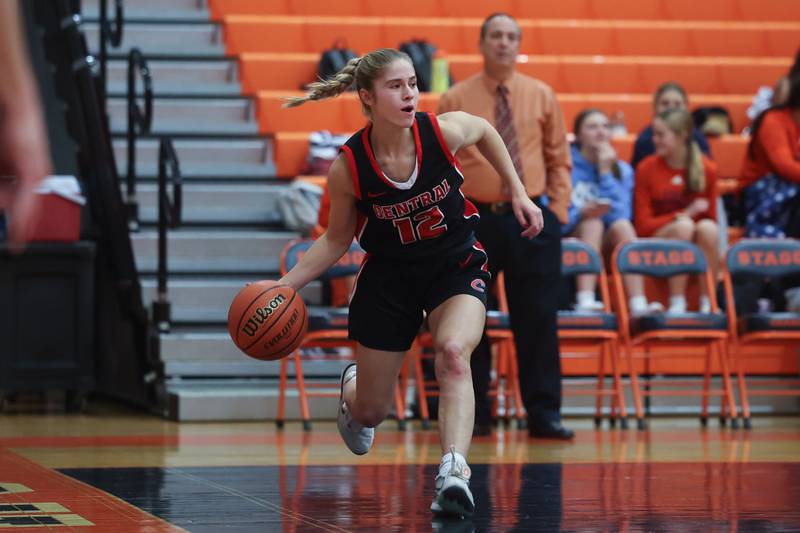 Lincoln-Way Central’s Brooke Katzmann works the baseline against Stagg on Monday, Dec. 11th, 2023 in Palos Hills.